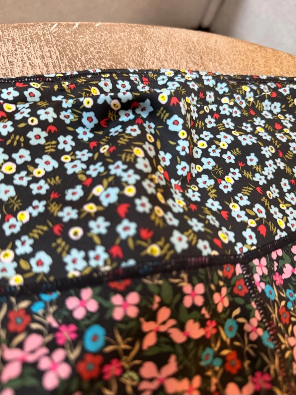 Nike Black Floral Leggings with Pink and Teal Accents